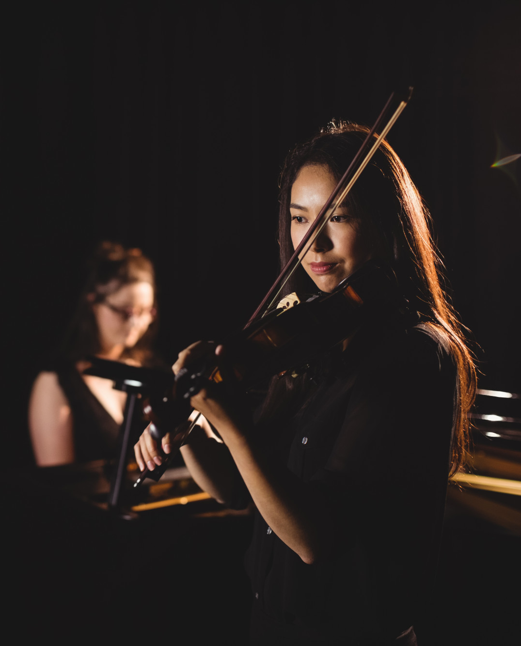 Klassisches Ensemble – Geigerin bei der Performance