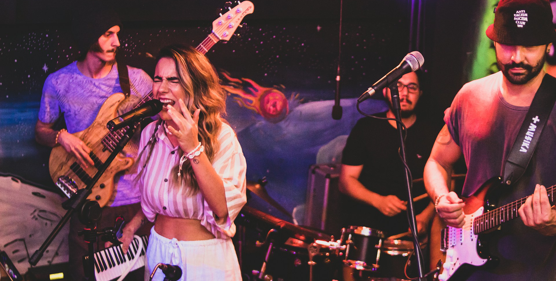 Five-piece cover band performing live on stage