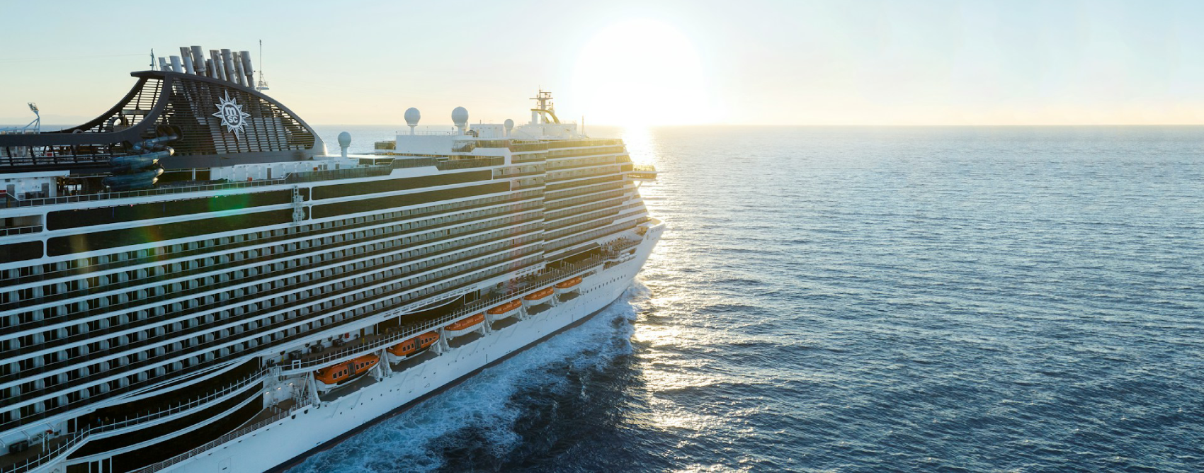 Cruise ship sailing at sea under open sky