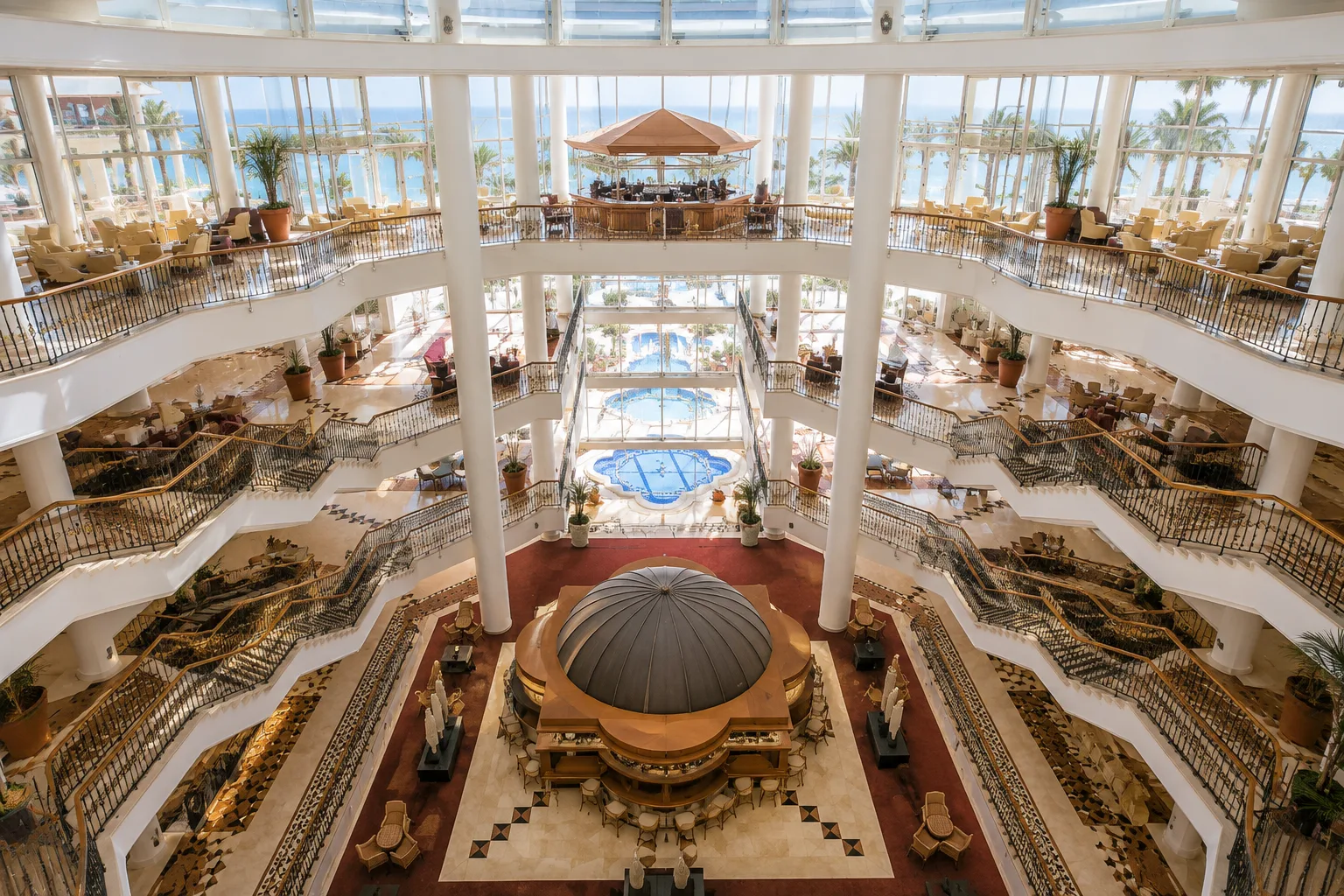 Luxury five-star hotel atrium with multi-story lobby